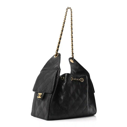 Chanel quilted caviar leather handbag, black, flap top with gold chain strap