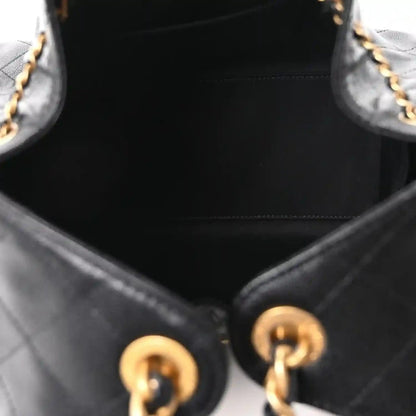 Chanel quilted caviar leather handbag, open top with gold ring hardware