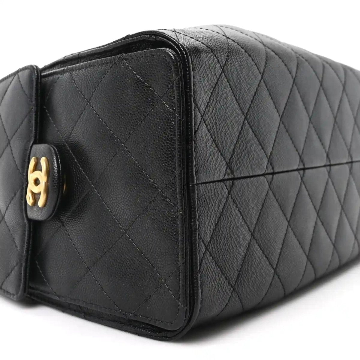 Chanel quilted caviar leather handbag, black, side panel with gold logo stud