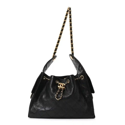 Chanel quilted caviar leather handbag, black, gold chain shoulder straps