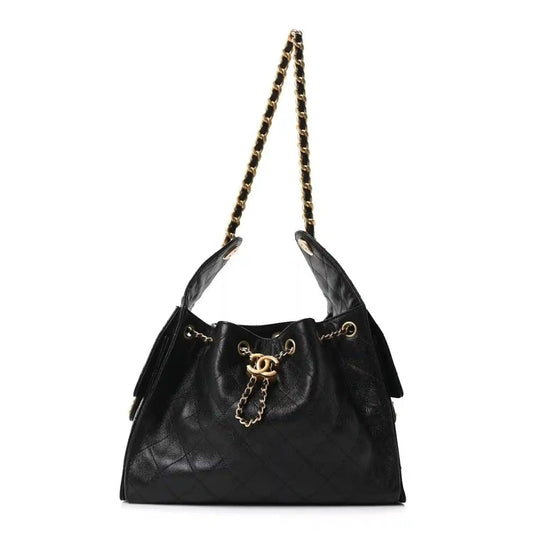 Chanel quilted caviar leather handbag, black, gold chain shoulder straps