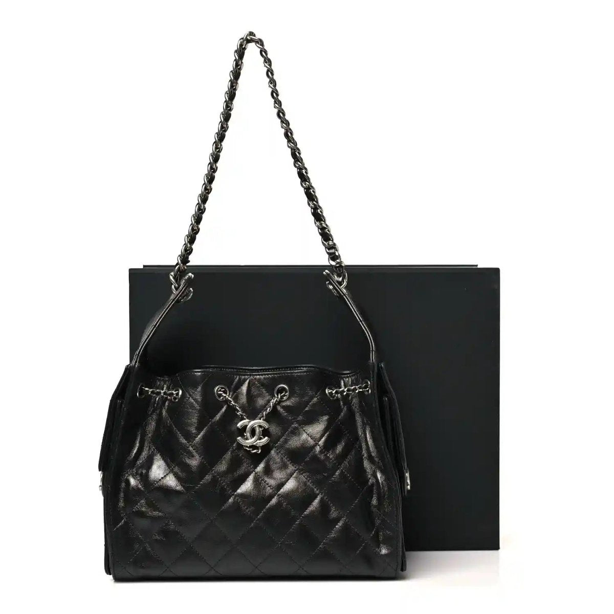 Chanel quilted black leather handbag with chain strap and CC emblem at front