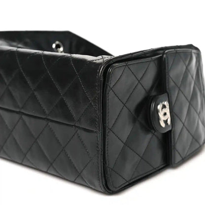 Small quilted shiny black calfskin handbag with diamond stitching and CC logo clasp