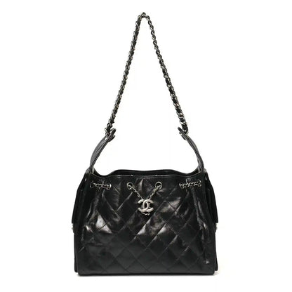 Chanel small black quilted leather handbag with chain handle and CC logo