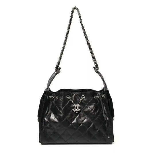 Chanel small black quilted leather handbag with chain handle and CC logo