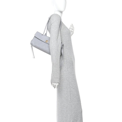 CHANEL small shopping bag, grey grained calfskin, side view with short handles