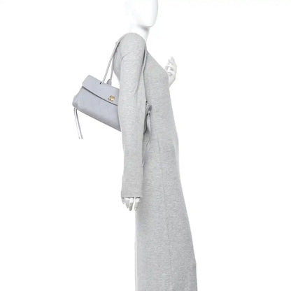CHANEL small shopping bag, grey grained calfskin, side view with short handles