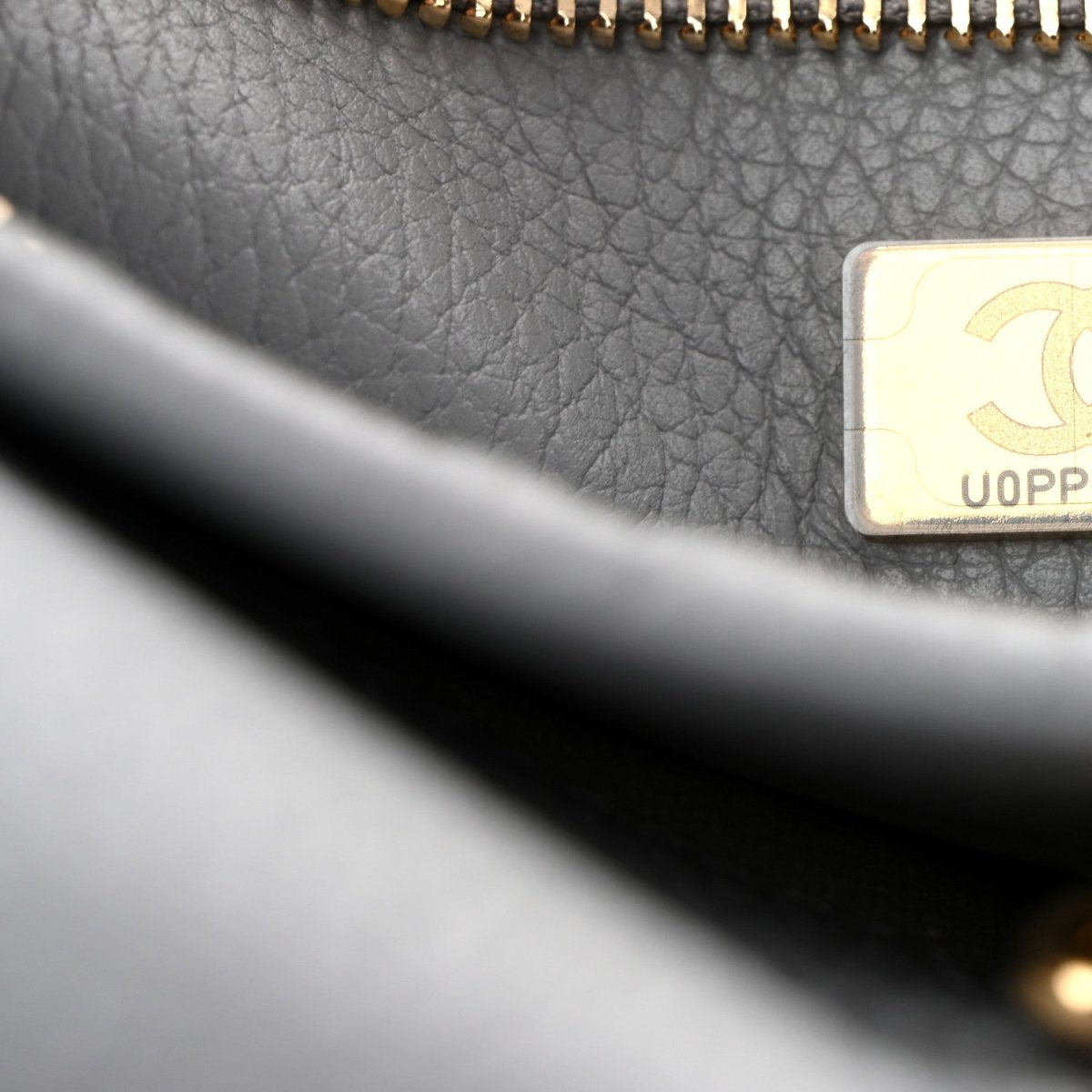 CHANEL small shopping bag interior label card with gold-toned chain and stitching