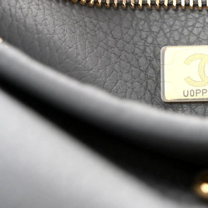 CHANEL small shopping bag interior label card with gold-toned chain and stitching