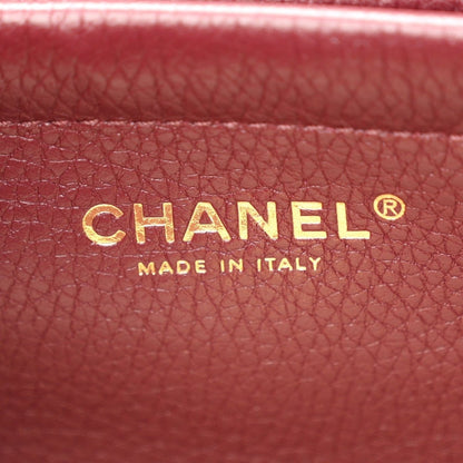 Chanel burgundy grained calfskin with CHANEL and Made in Italy text
