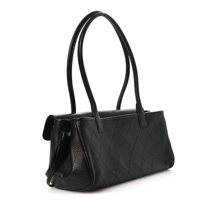 Chanel black small shopping bag with double handles and quilted leather texture
