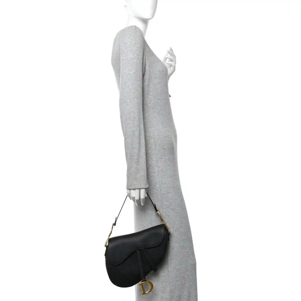 Black grained calfskin saddle bag worn on shoulder with short strap