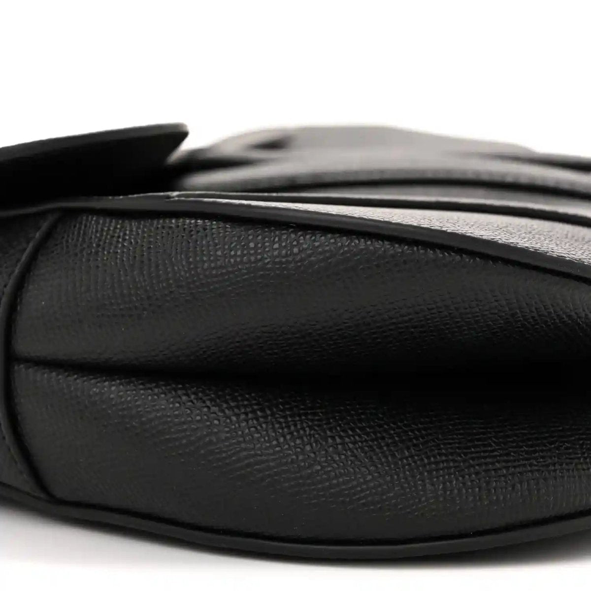 Black grained calfskin saddle bag with smooth side panel and top edge