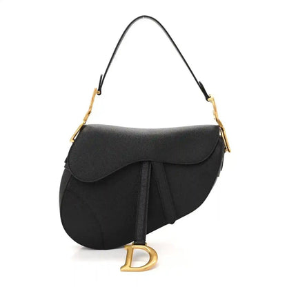 Black grained calfskin saddle bag with flap and gold-tone D hardware