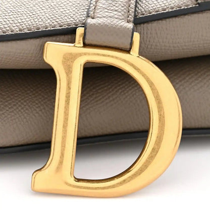 Clay green grained calfskin saddle bag with gold D-ring hardware