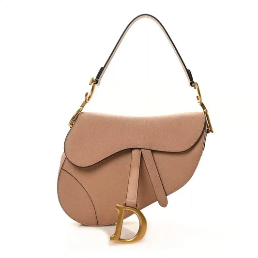 Light pink grained calfskin saddle bag with top straps and Dior D charm
