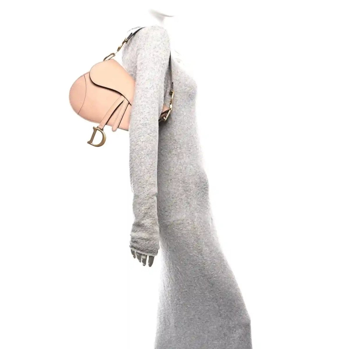 Light pink grained calfskin saddle bag with Dior D charm on shoulder strap