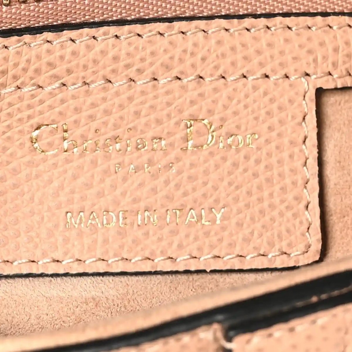 Christian Dior grained calfskin label patch reading Made in Italy