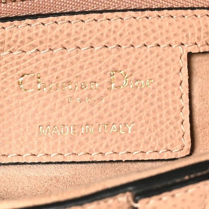 Christian Dior grained calfskin label patch reading Made in Italy