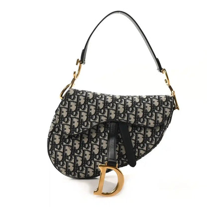 Saddle shoulder bag in blue-and-black Dior Oblique monogram canvas with gold hardware