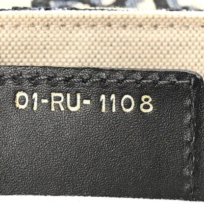 Leather interior tag with code “01-RU-1108” on black lining