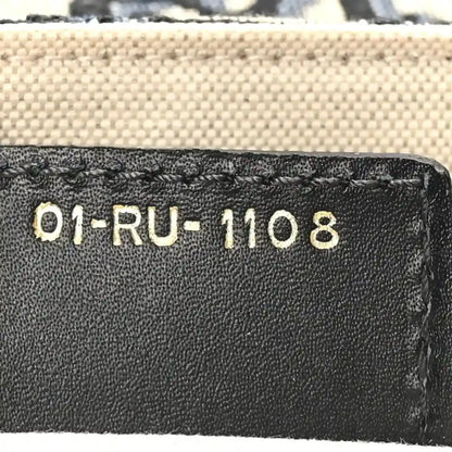 Leather interior tag with code “01-RU-1108” on black lining