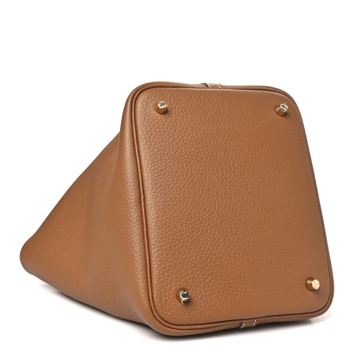Calfskin leather tote with rounded top, corner studs, and gold hardware lock