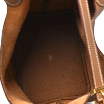 Calfskin leather tote interior lining with embossed logo at the base