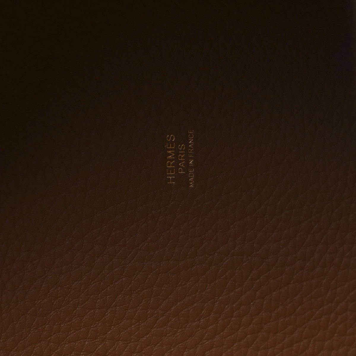 Hermes embossed calfskin leather detail on the tote interior