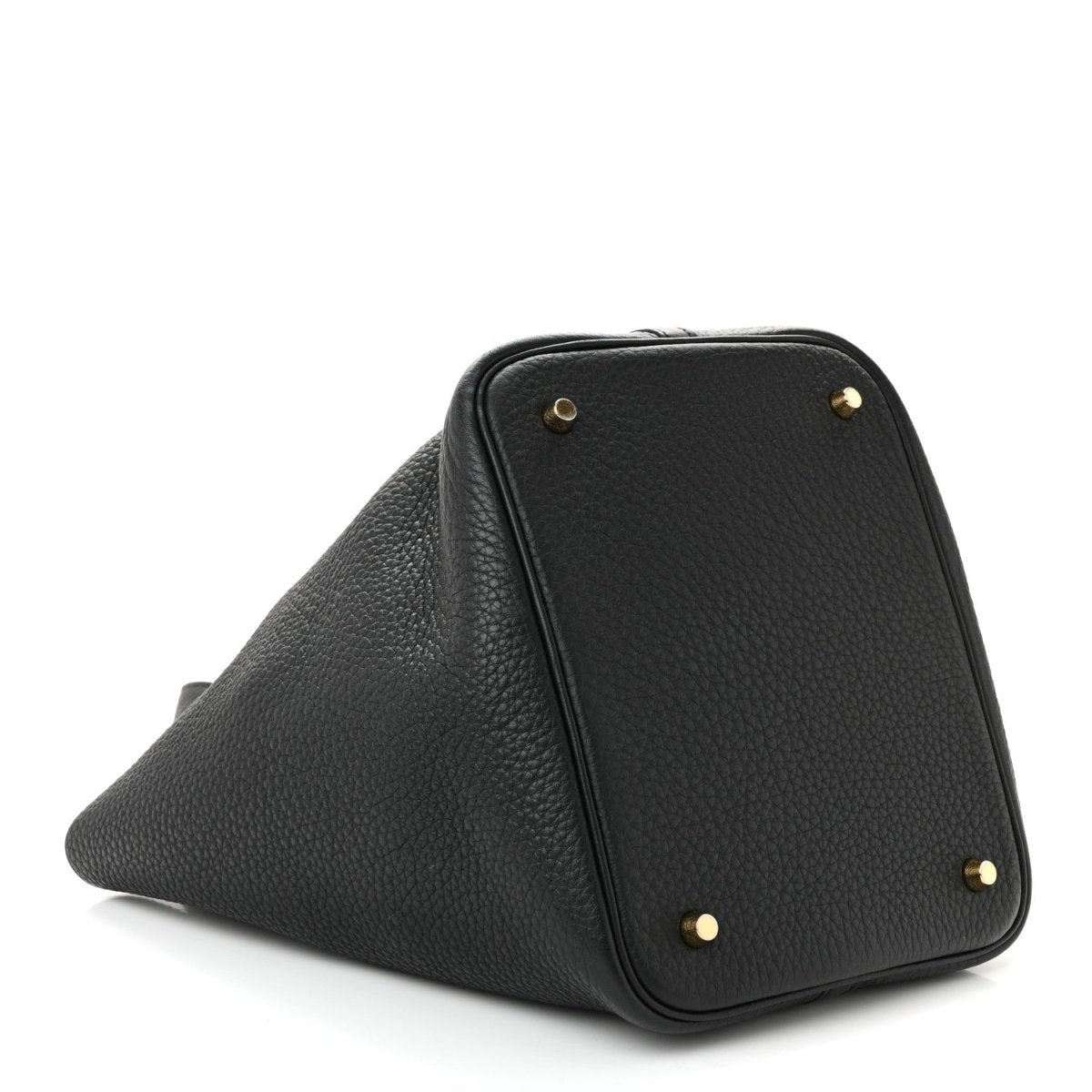 Black pebbled leather tote handbag with gold-tone corner studs and angled shape.