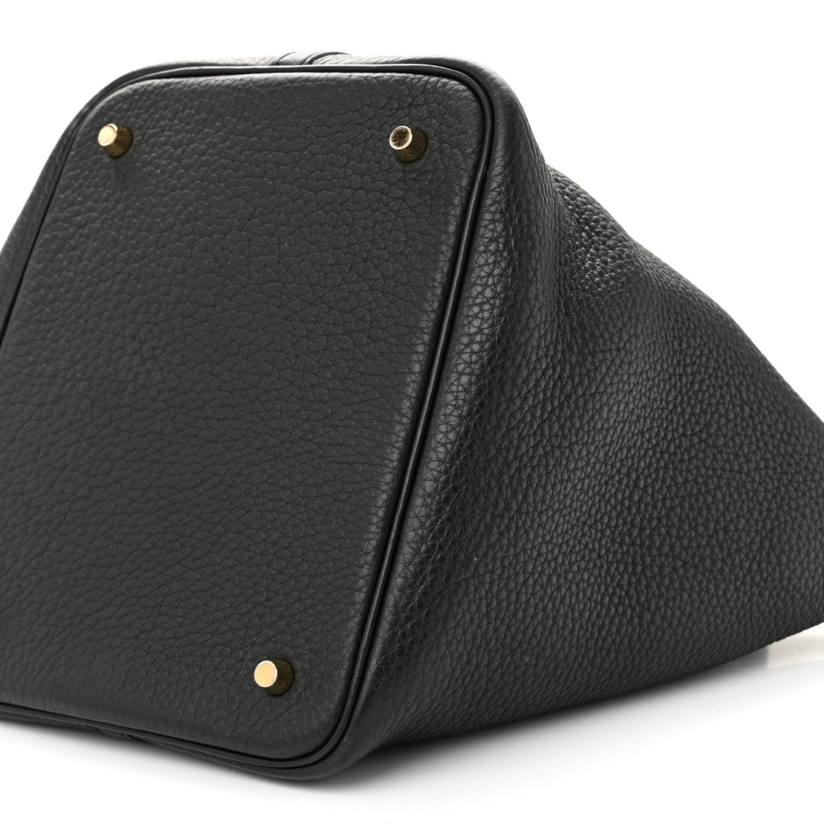 Black leather tote handbag with gold stud corners and top lock detail