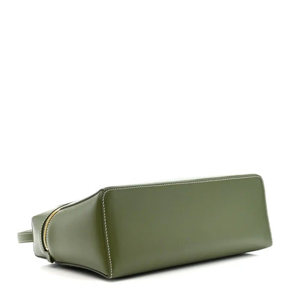 Olive green leather mini bag with gold-trim zipper and clean, flat profile