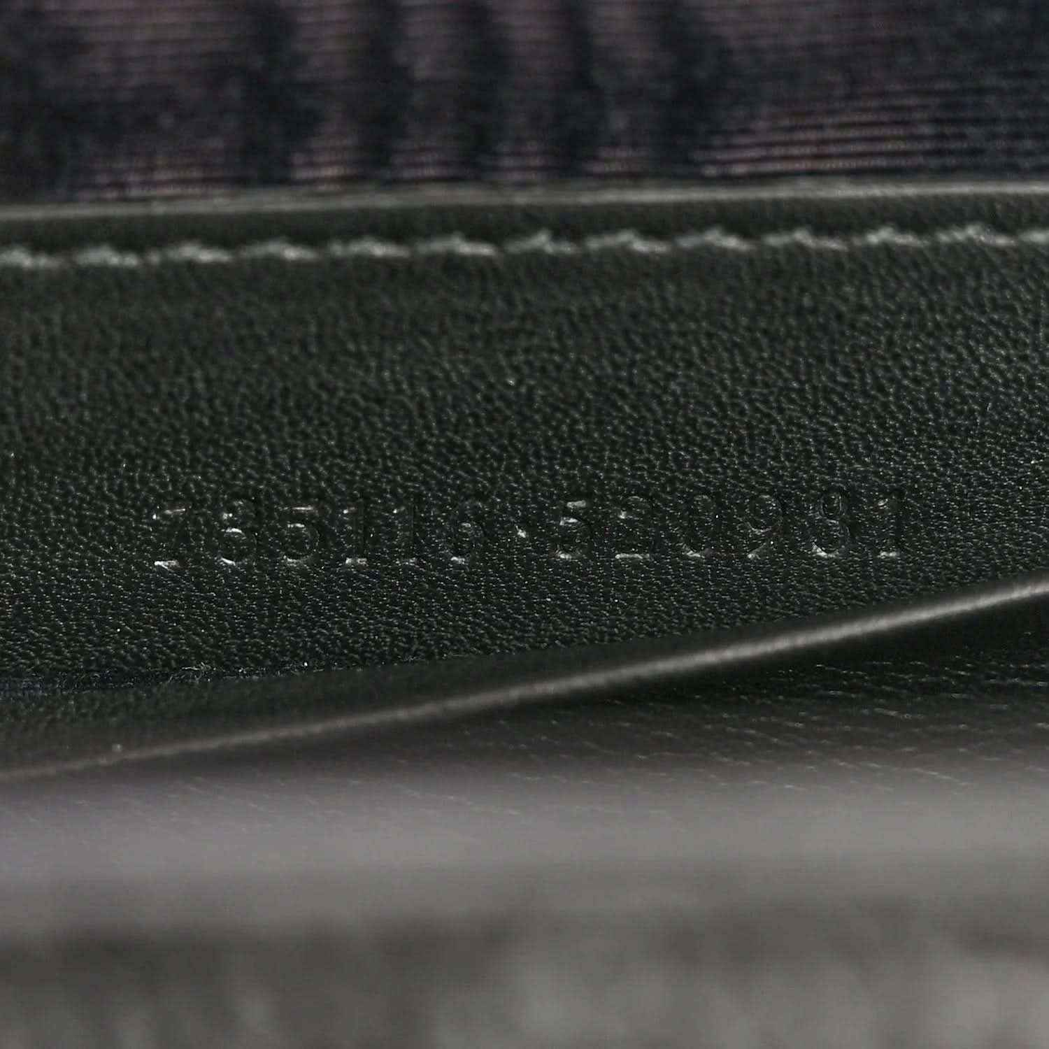 Leather lining with Gucci logo emboss and visible stitching detail