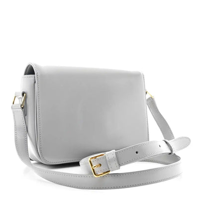 Shiny calfskin shoulder bag with adjustable strap and gold-tone buckle