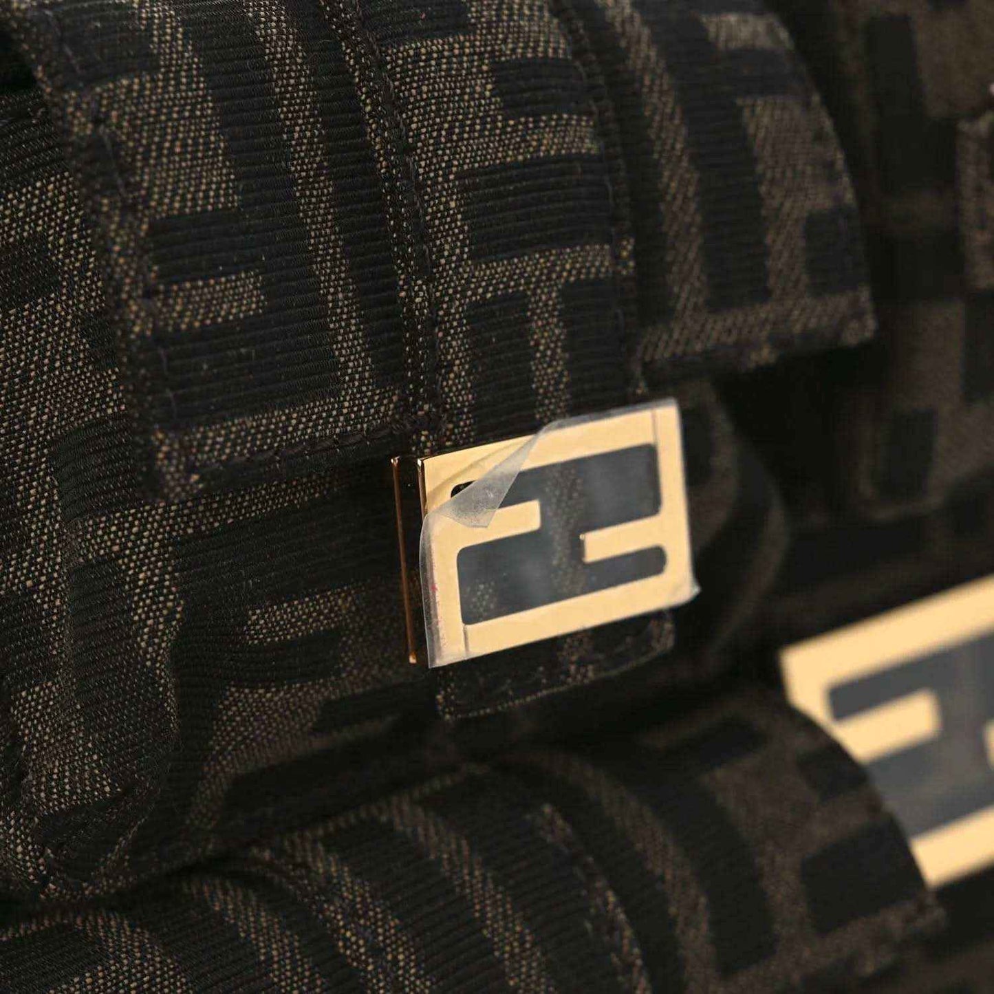 Jacquard baguette bag with FF logo plaque on dark patterned fabric