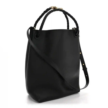 Black bucket bag in silky calfskin with braided handles and crossbody strap