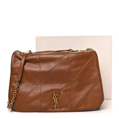 Tan-brown leather quilted shoulder bag with YSL monogram, flap, and chain strap.