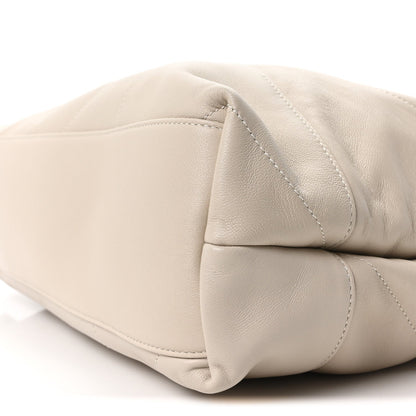 Cream lambskin matelasse large Jamie pouch bag with curved top and stitched panels