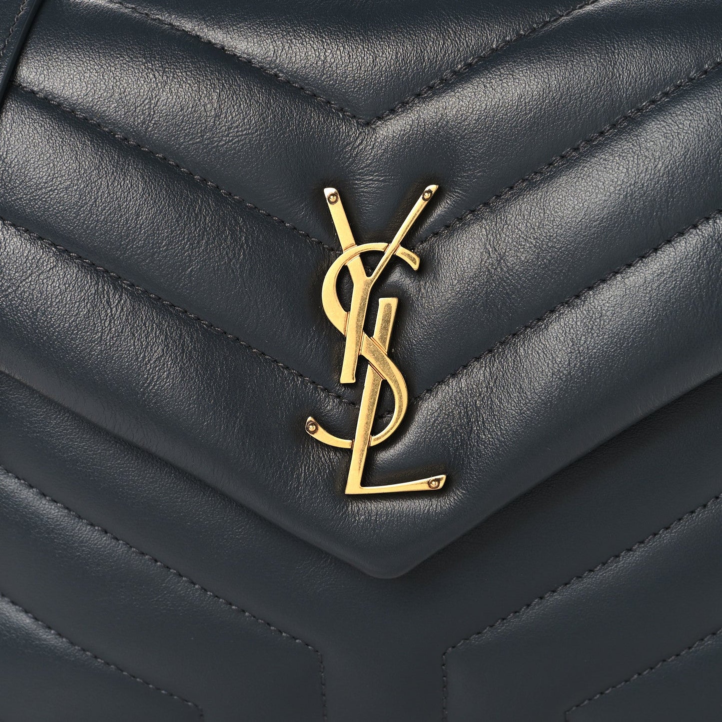 Saint Laurent quilted leather satchel front with gold YSL monogram, dark blue