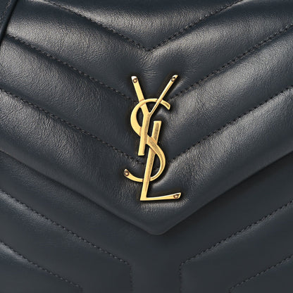 Saint Laurent quilted leather satchel front with gold YSL monogram, dark blue