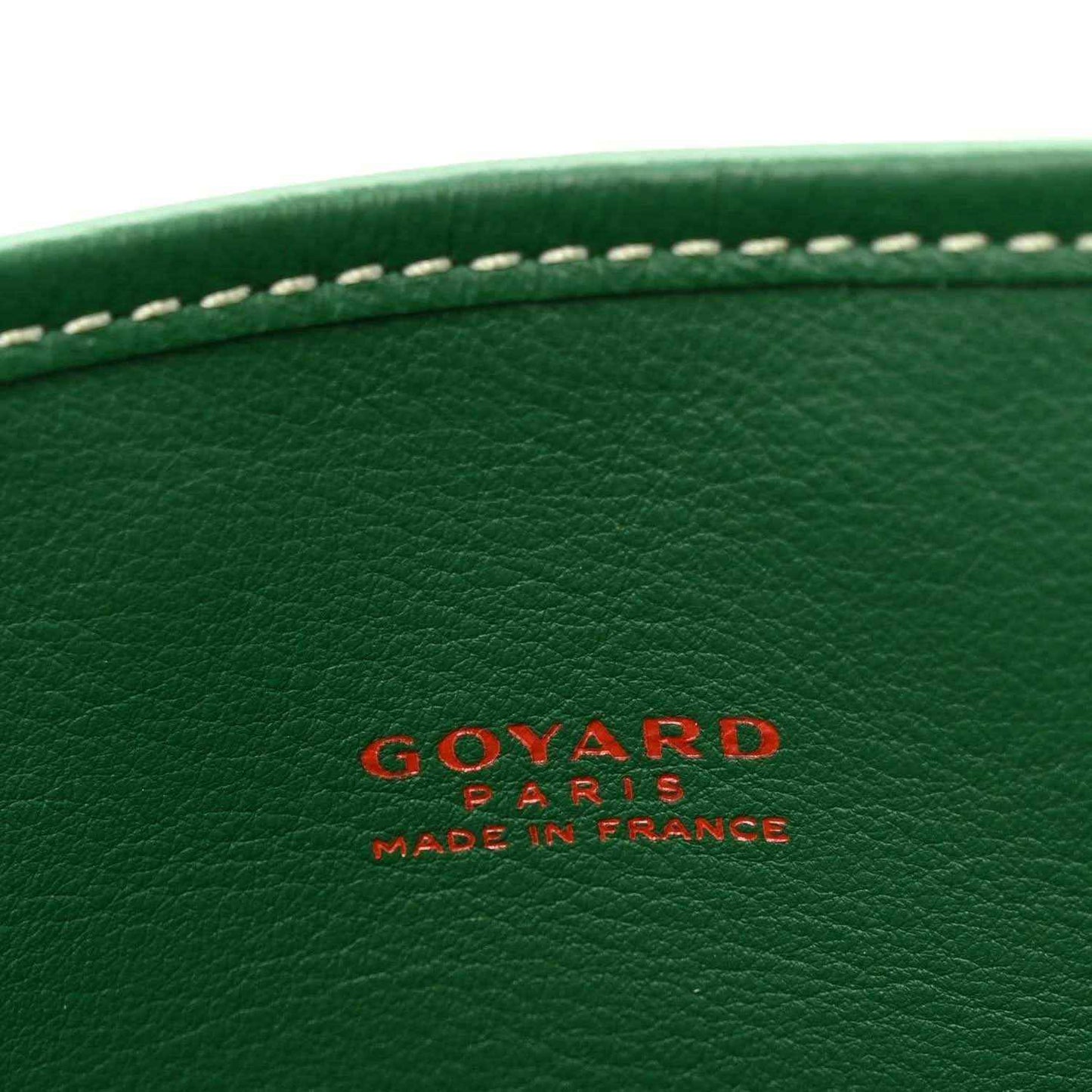 Green mini tote bag with Goyardine logo stamp and “Made in France” text