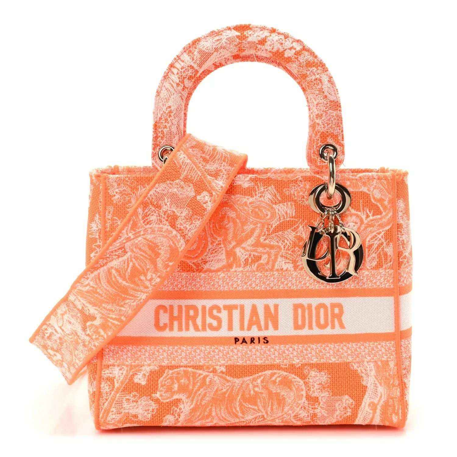 Orange embroidered tote bag with top handles, Dior logo ribbon and charm detail.
