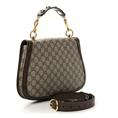 Medium GG Supreme monogram top-handle bag with adjustable strap and gold-tone hardware