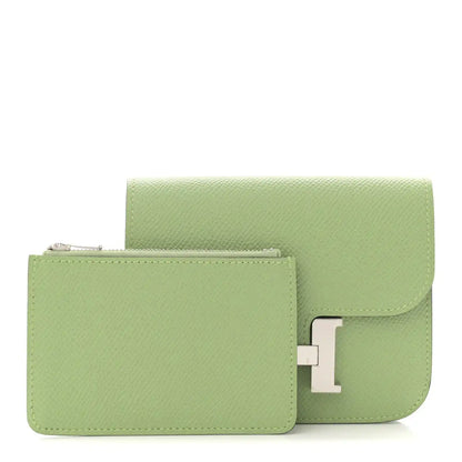 Light green slim wallet with H clasp and attached cardholder, front view