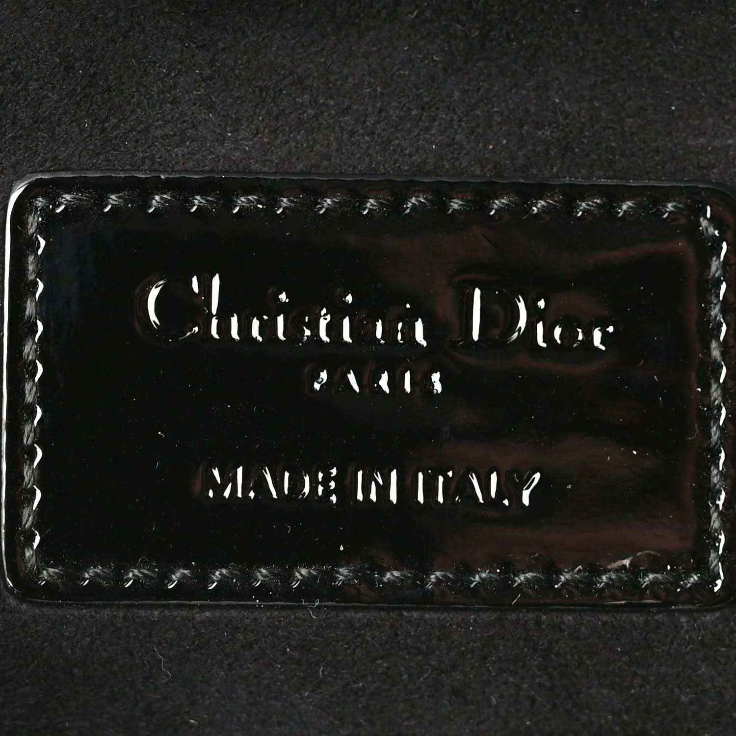 Christian Dior logo patch on black patent leather lining