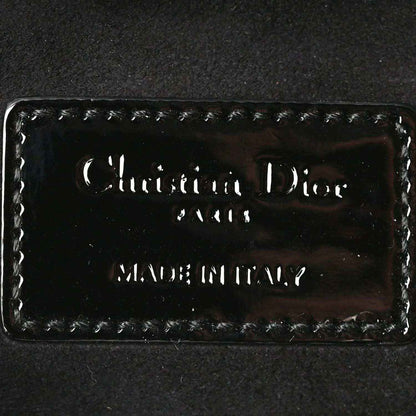 Christian Dior logo patch on black patent leather lining