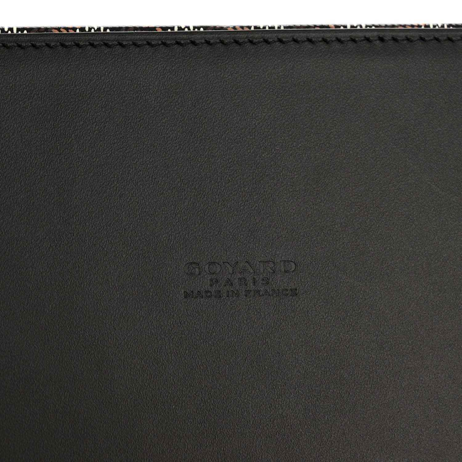 Black leather panel detail with subtle embossed Goyard branding