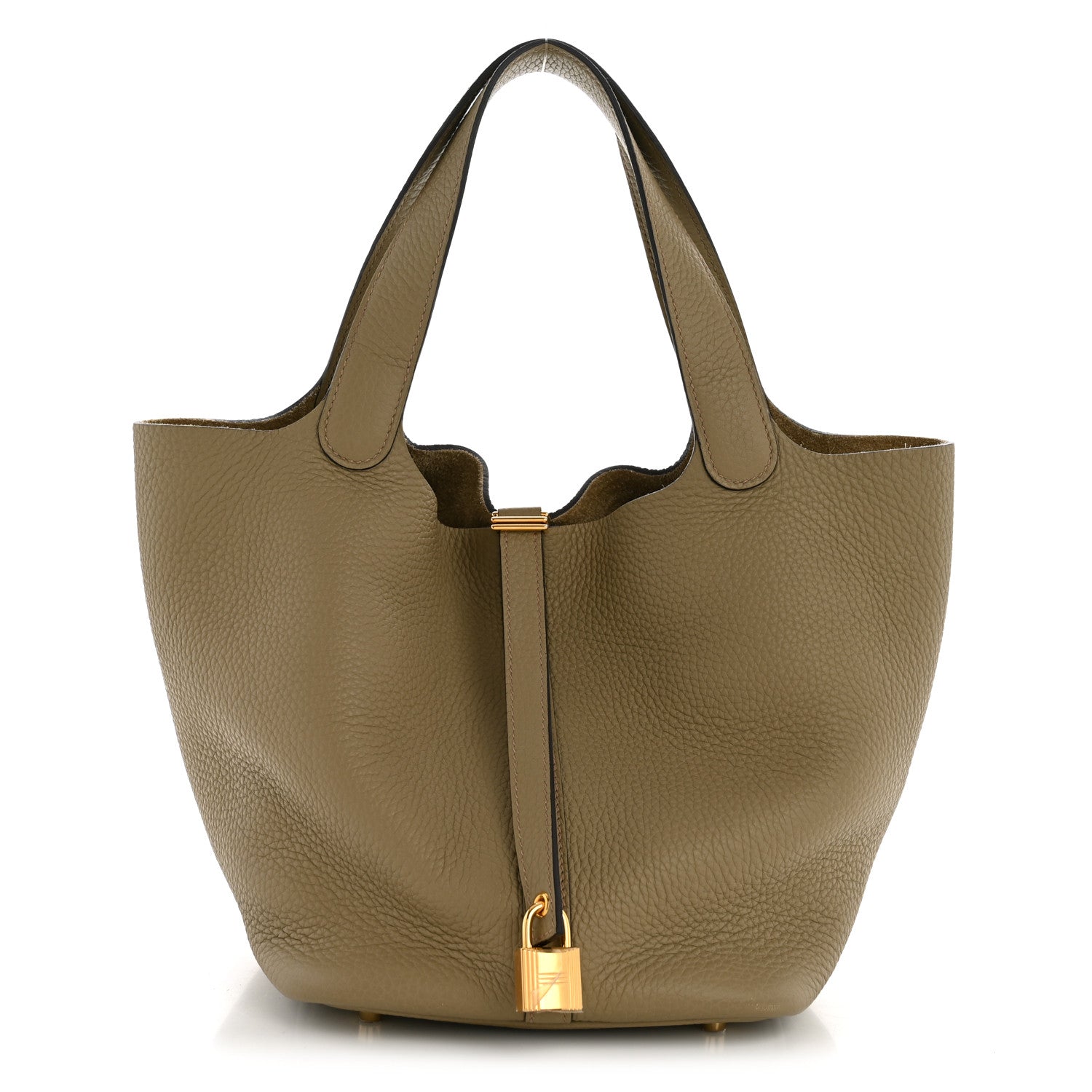 Beige leather tote with top handle, central lock closure, and gold hardware