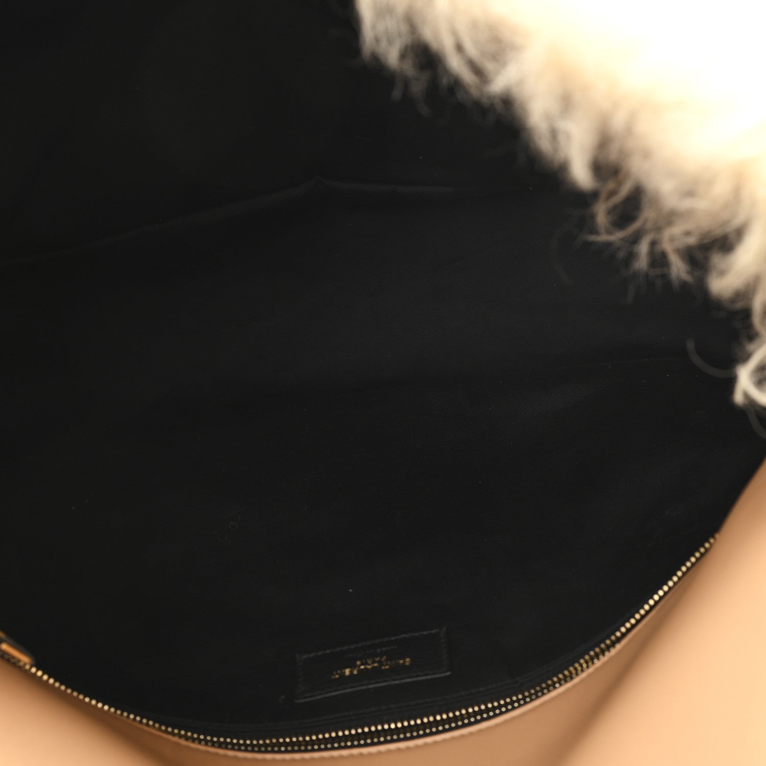 SAINT LAURENT shearling bag lining, black interior with zipper and logo patch