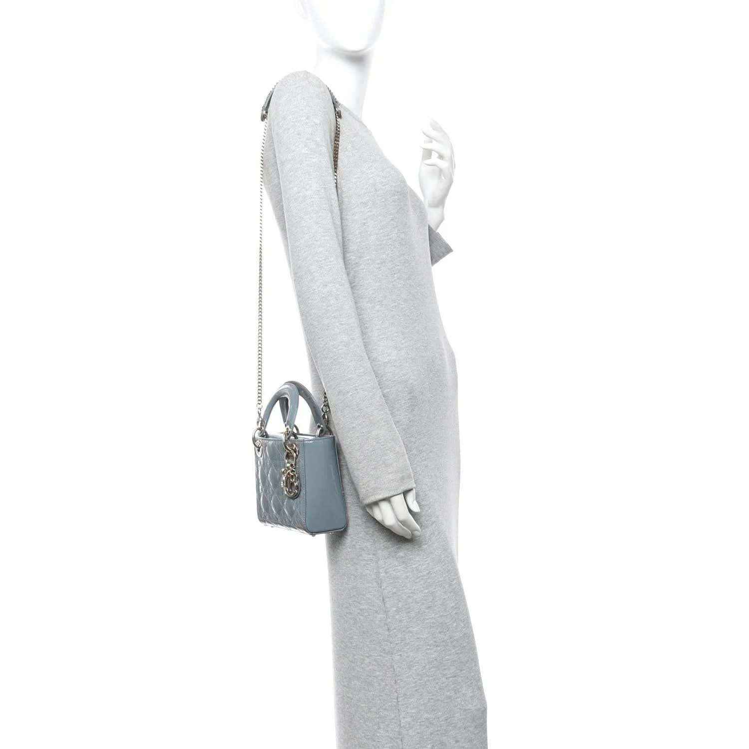 Light blue mini Lady Dior bag worn on a shoulder with chain strap